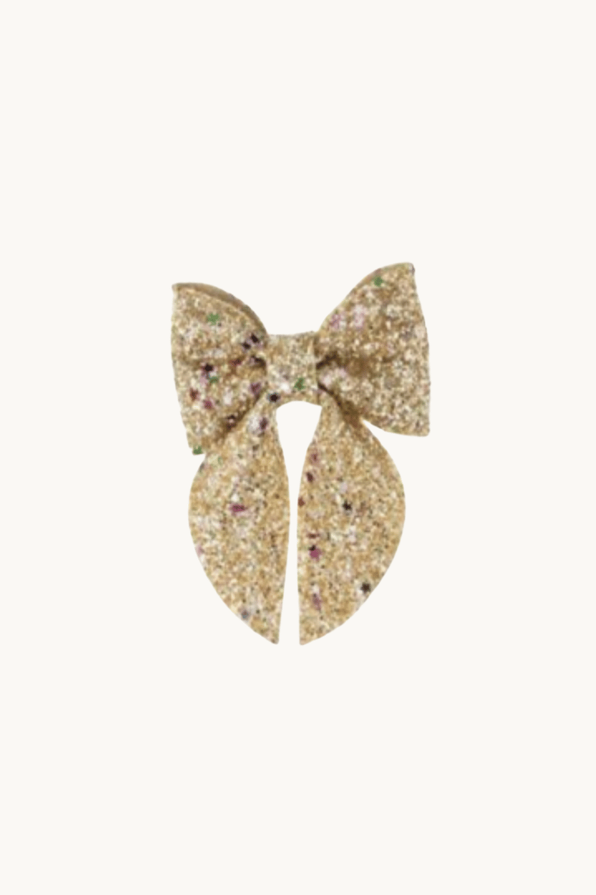 Nœud pour cheveux à sequins dorés