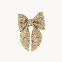Nœud pour cheveux à sequins dorés