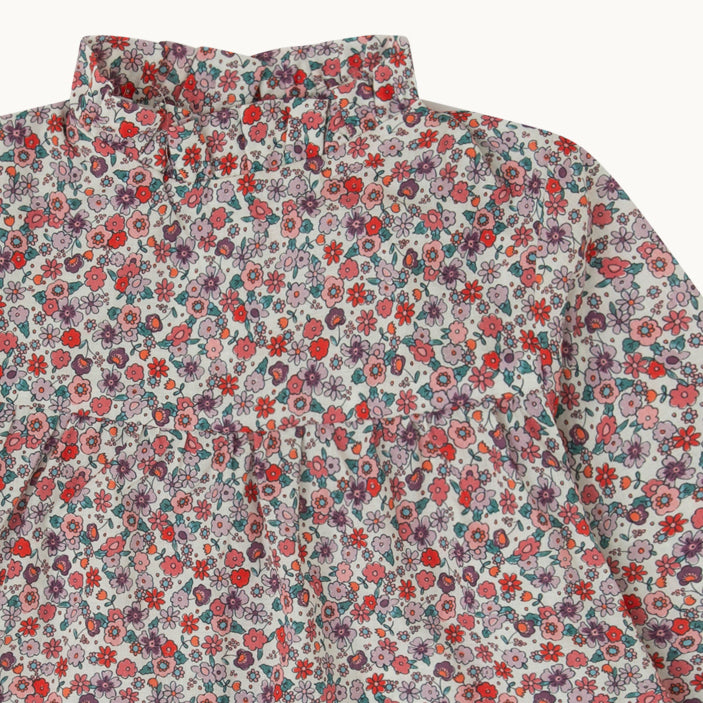 BLUSA BEBÉ FLORES ROJAS